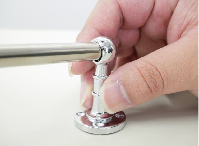 両端に首長ゲンコをはめる